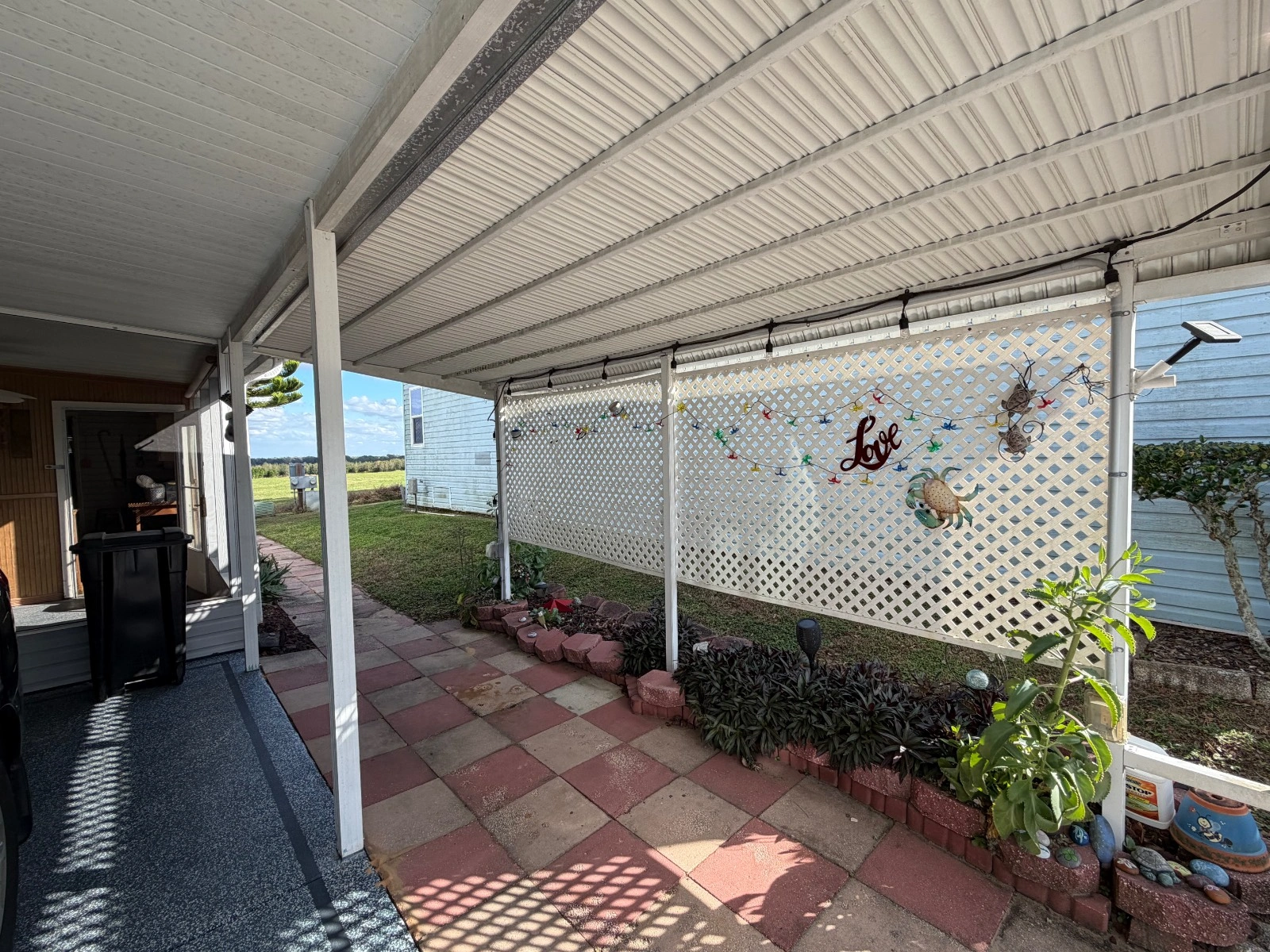 3&2 10916 Homes of Merit Manufactured Home (5) shuffleboard courts, land-lease communities, Southfork, redman manufactured homes dade city, Homes of Merit Manufactured Home